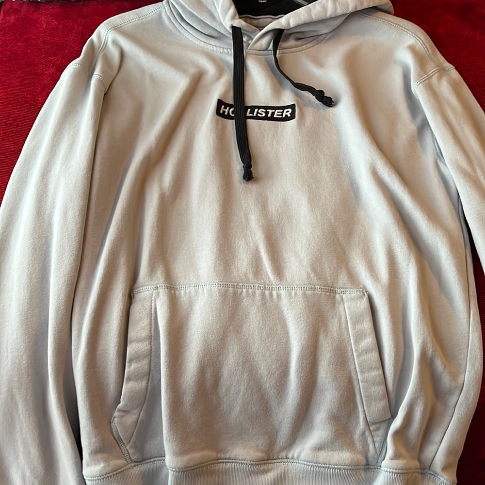 baby blue men/women hollister hoodie, size M